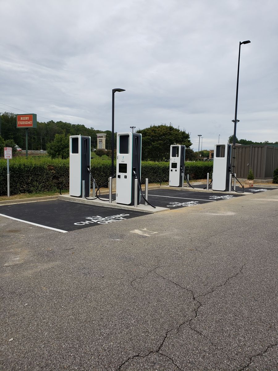 Commissioned chargers and pole lighting
