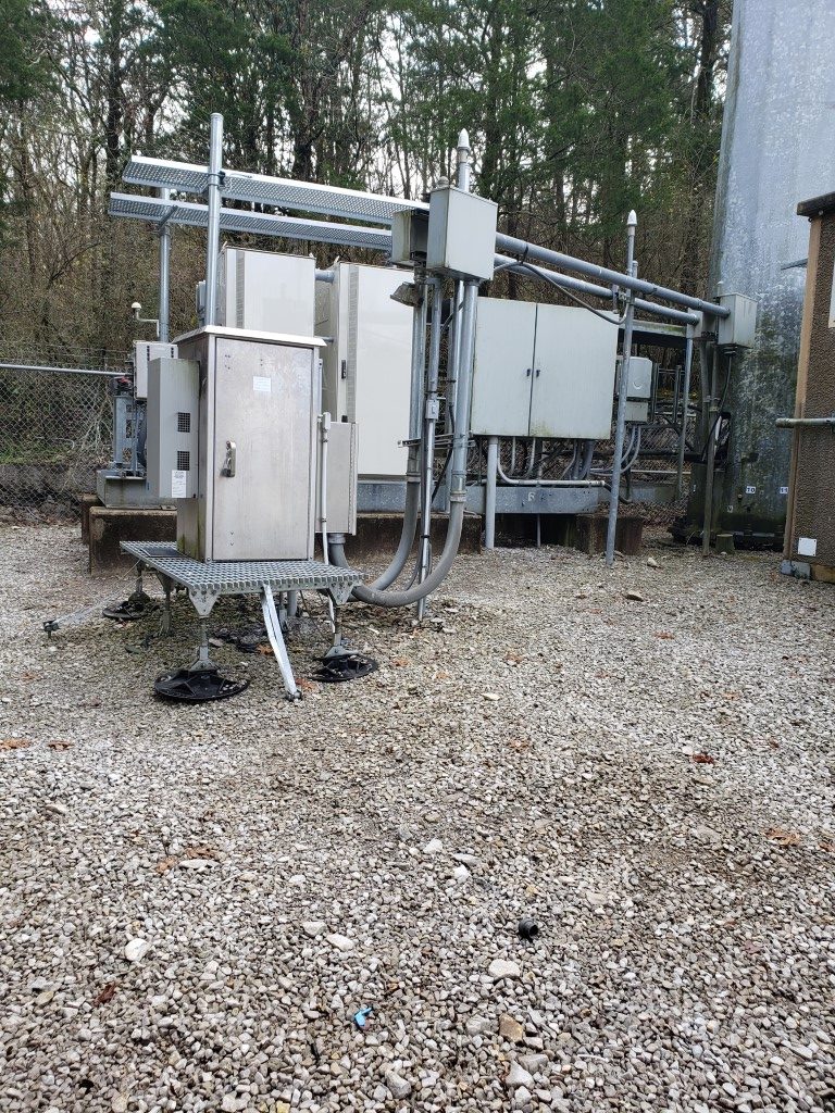 New switchgear and equipment enclosures on a gravel pad