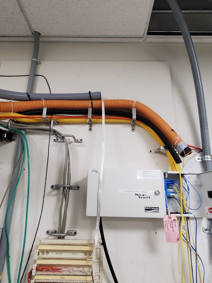 Feeder conduits landing on a new panelboard